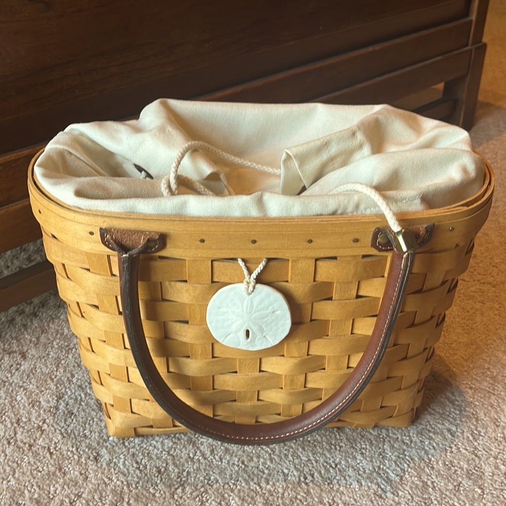 The works package of unused Longaberger Beach Boardwalk Basket and accessories!